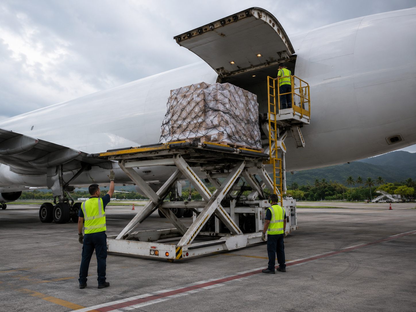 Cargo being loaded onto a freighter aircraft